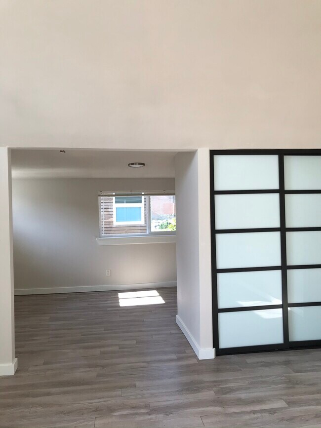 Looking toward dining room and laundry - 916 Martin Luther King Jr Way S.