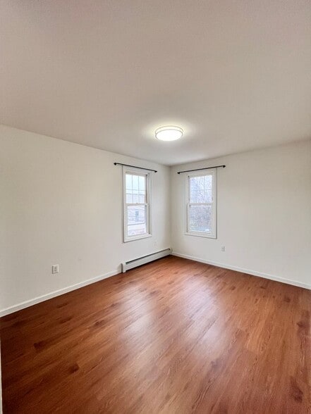 Building Photo - 64-03 Perry Ave