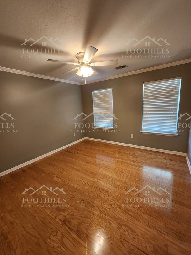 Building Photo - Beautiful 3-Bedroom Brick Home with Sunroo...
