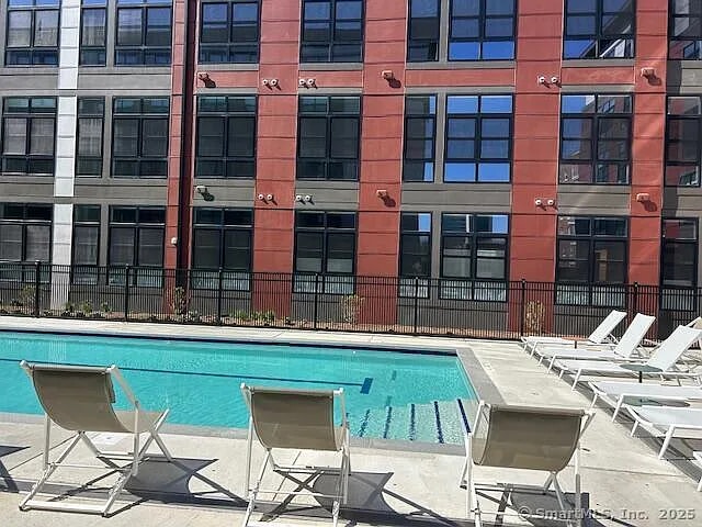 Building Photo - Toll Brothers apartment living communities combine