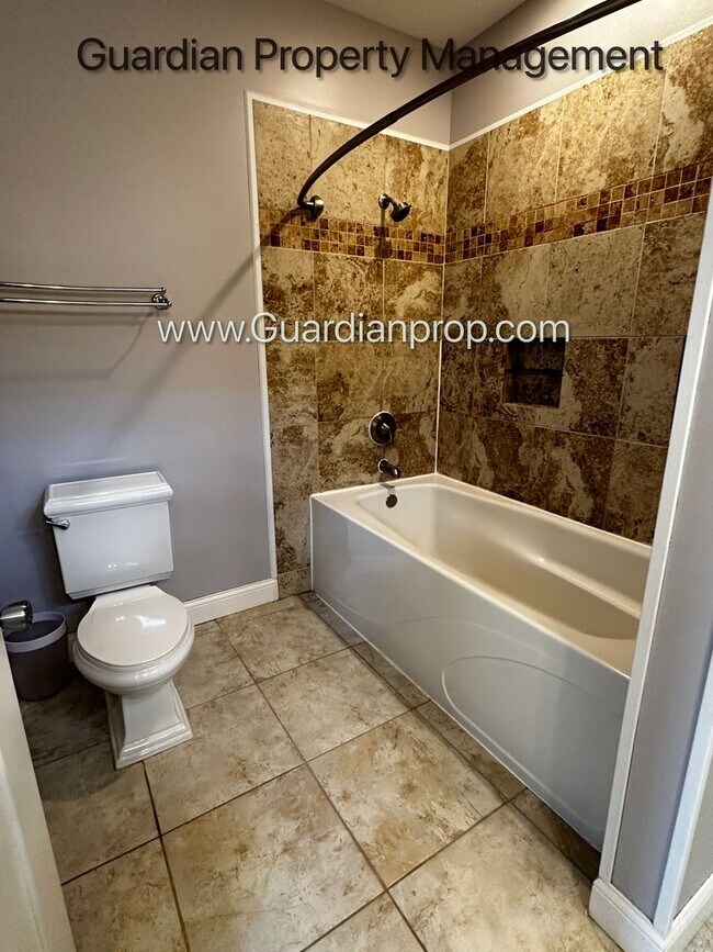 Building Photo - Spacious Uptown Side By Side, Dishwasher, Garage, In Unit Laundry, Private Rooftop Deck