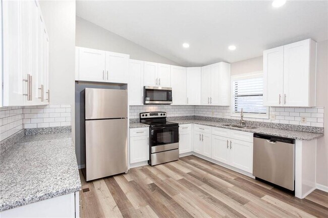 Building Photo - 4049 Leicester Dr NE