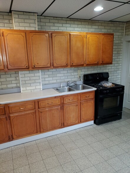 Kitchen (new ceiling tiles and can lights) - 522 E 22nd St
