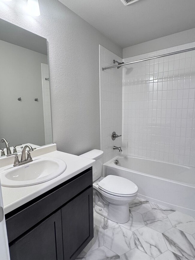 Building Photo - Sage Meadows II Townhomes — Lakeside Living Meets Modern Comfort!