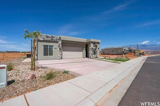 Building Photo - PETS ALLOWED!  Spacious & Modern 3-Bedroom Home for Rent Near Sand Hollow Reservoir