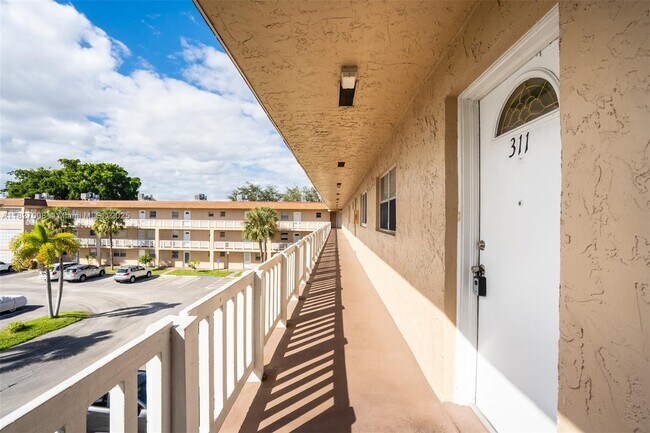Building Photo - 608 SW Natura Blvd