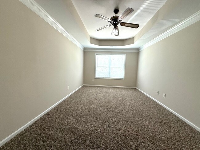 Building Photo - Welcome to this charming 3 bedroom, 2.5 ba...