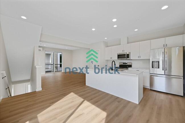 Building Photo - Brand-New 2026 Townhome | 3 Bed | 2.5 Bath | 1,560 Sq Ft | EV Garage | A/C Included