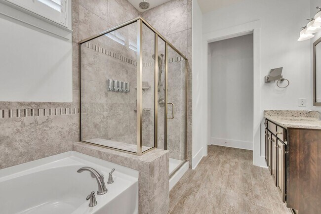 Building Photo - Beautifully maintained and move-in ready, this stunning mostly one-level all-brick home