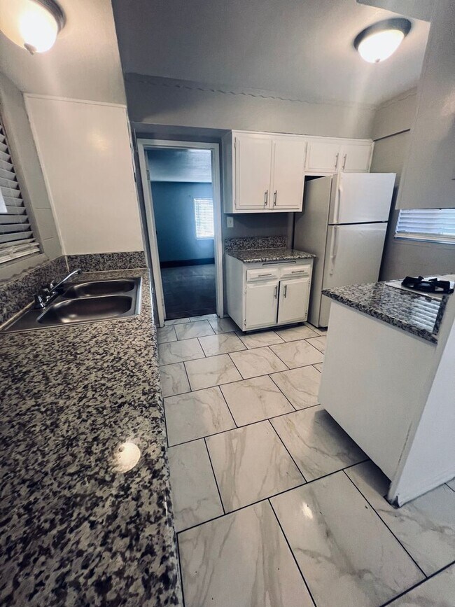 Building Photo - Lock in ($2100) off February 2026  if you move-in by December 29, 2025.