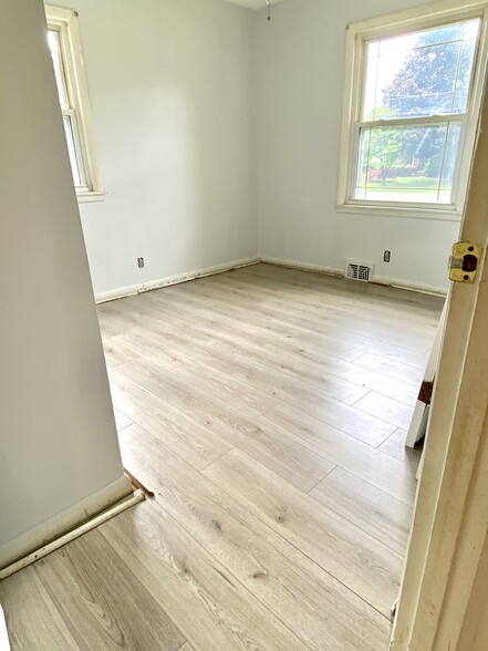 2nd bedroom, trim to be finished early June. - 8003 Broadfern Dr