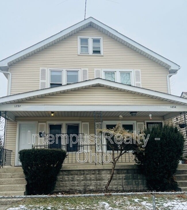Building Photo - 1252 E 23rd Ave