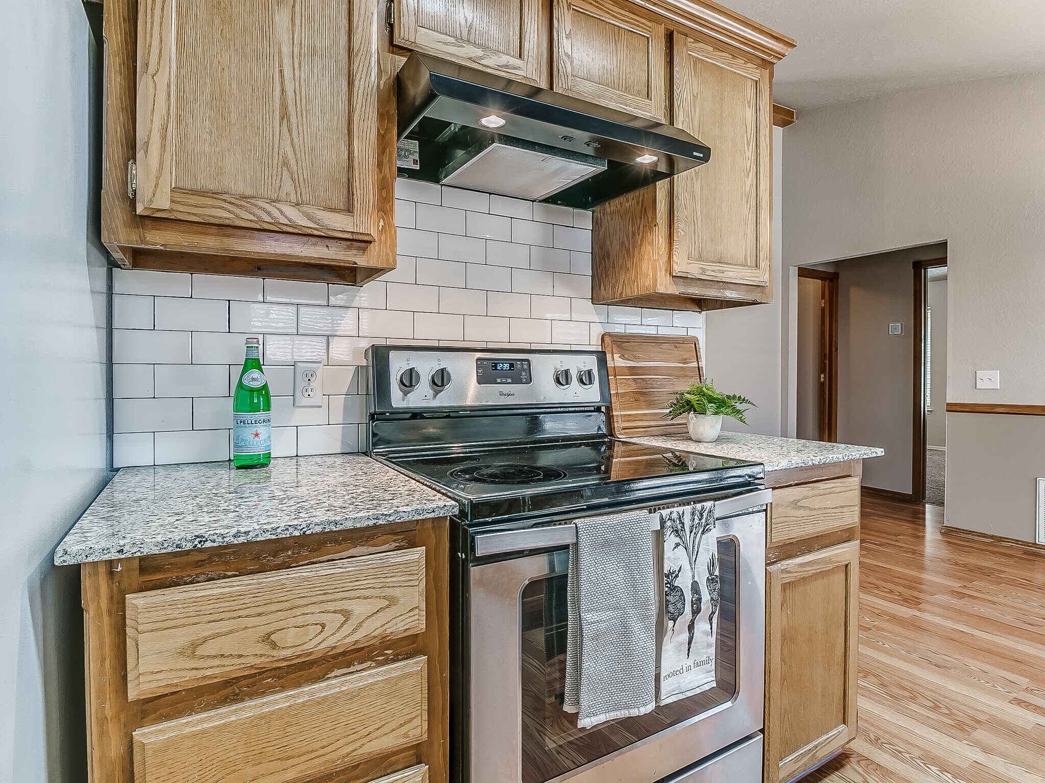 Updated kitchen with subway tile backsplash - 1821 Overland Trail