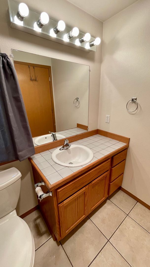 Building Photo - Large 2 Bedroom 2.5 Bath Home With Fenced Yard & Wrap Around Deck in Clearwood Community! Lake, T...