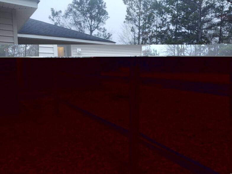 View to side/back of apartment - 247 Hereford Cir