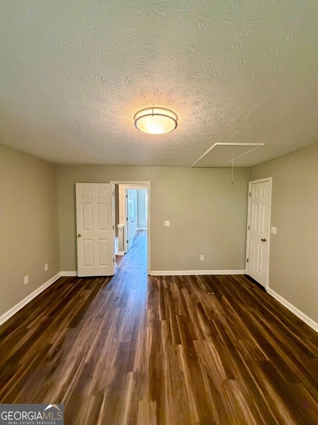 Building Photo - 5696 Windfall Ln