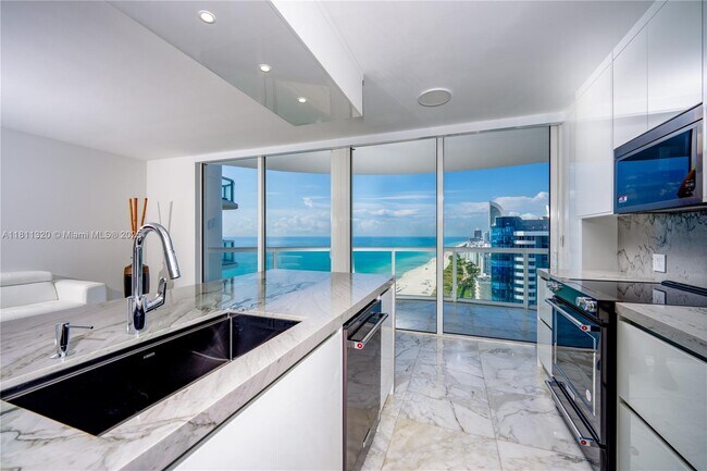 Building Photo - 6365 Collins Ave