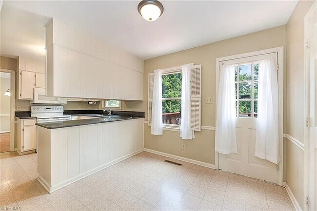 Building Photo - Earn Wealth While Leasing - Like a Homeown...