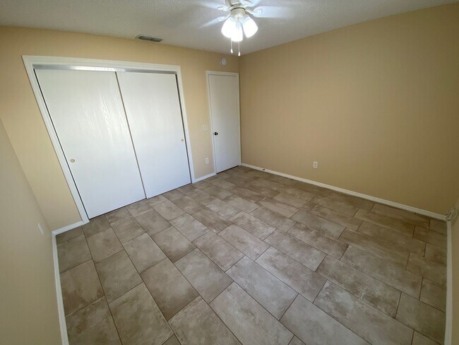 Building Photo - Charming Just Renovated Unfurnished ANNUAL LEASE - 2 Bedroom 2 Bath Patio Villa - Located In The ...