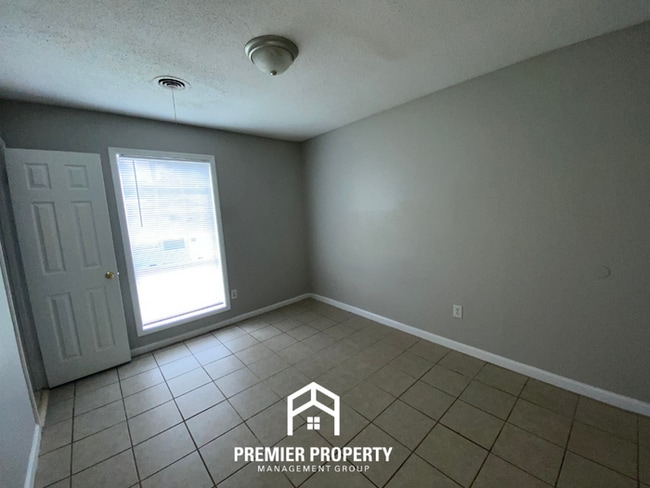Building Photo - Spacious 4BR Family Home in Raleigh | Modern Tile Floors & Spacious Backyard