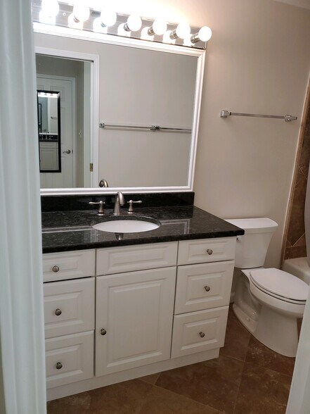 2nd Bedroom vanity, Shower, Toilet - 25116 Plantation Dr NE