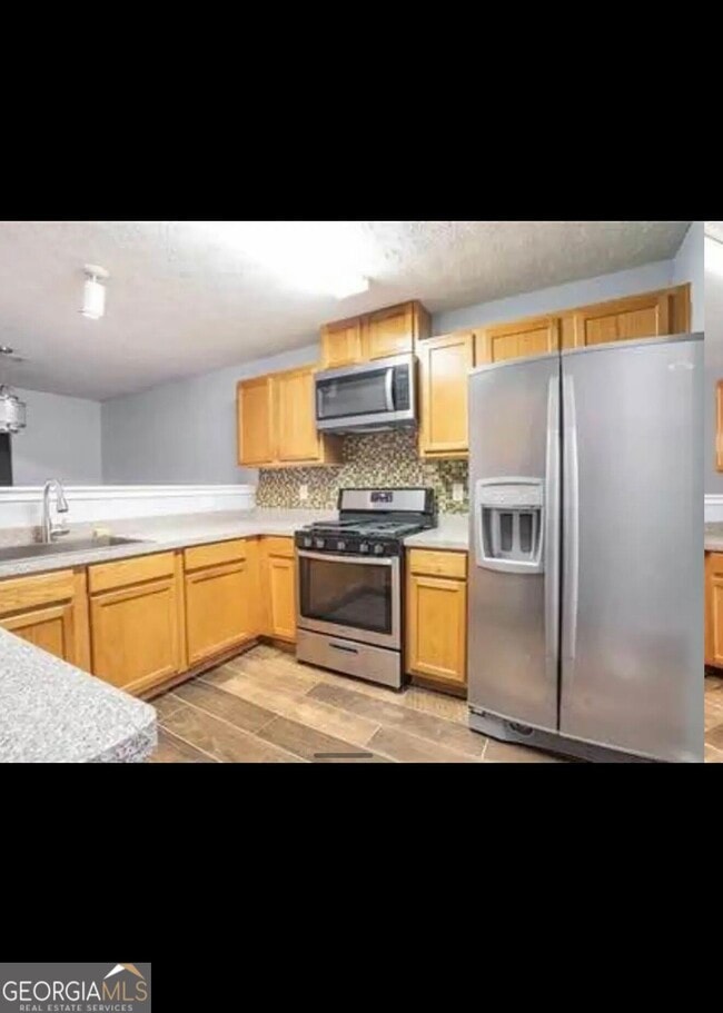 Building Photo - 5563 Windfall Ln