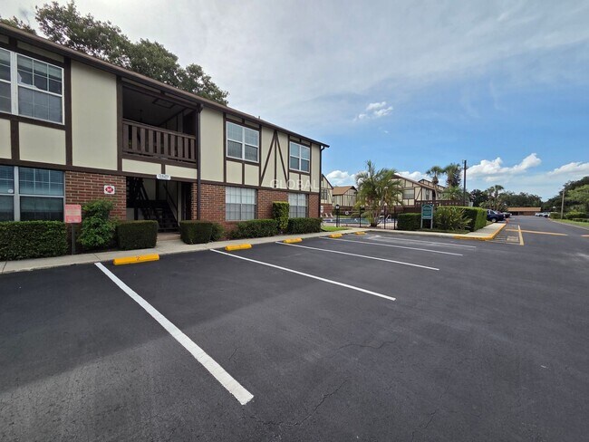 Building Photo - Lakefront First-Floor Condo in Camelot by ...