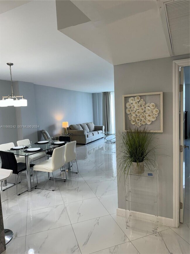 Building Photo - 19370 Collins Ave