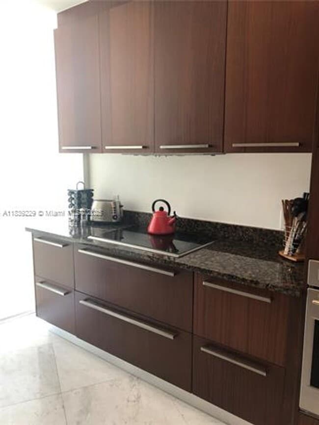 Building Photo - 15811 Collins Ave