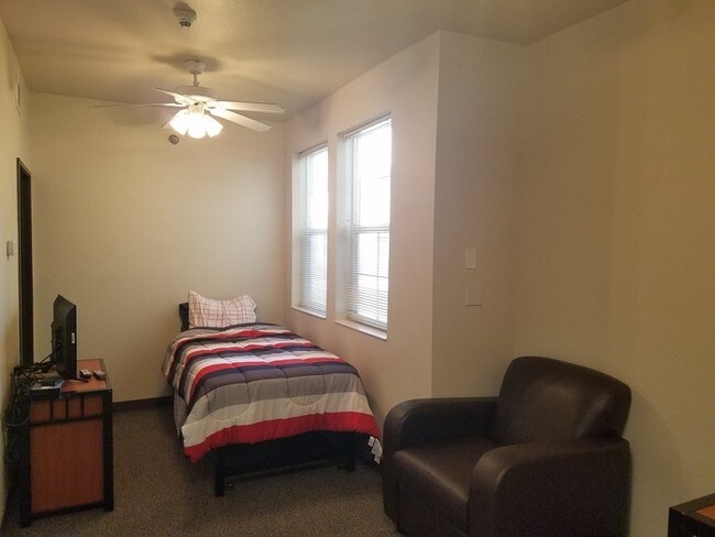 Building Photo - Furnished, main level studio apartment