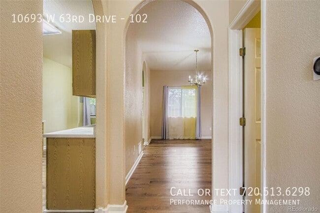 Building Photo - 10693 W 63rd Dr