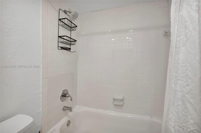 Building Photo - 5401 Collins Ave