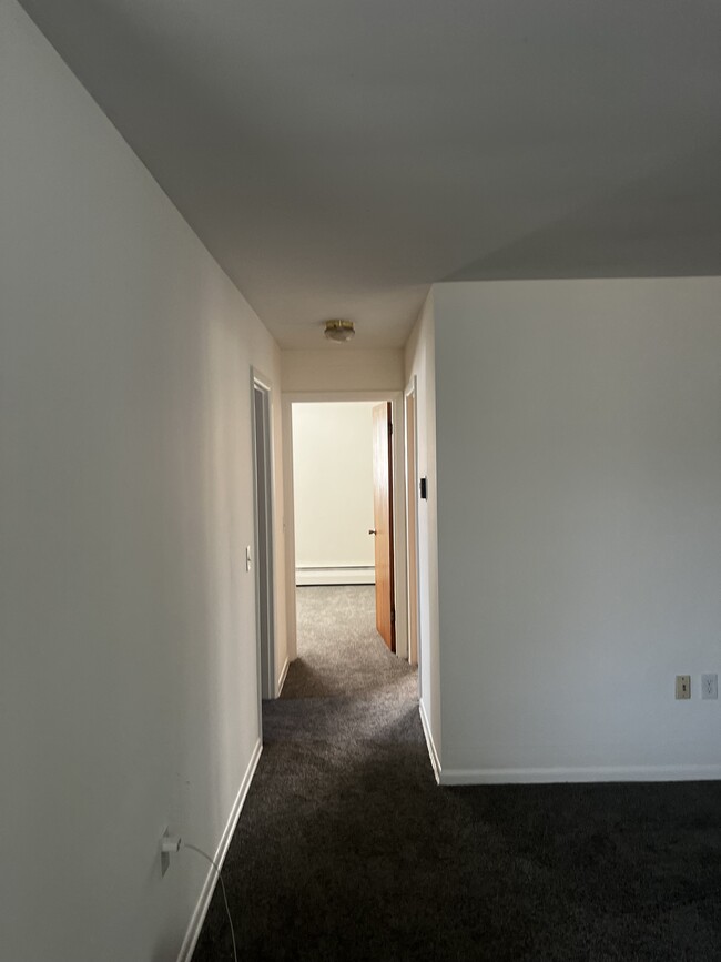 Hallway to bathroom and bedrooms - 8586 Cottonwood Dr