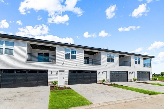 Building Photo - New 3 Bed Townhome with Covered Deck and Oversized Garage!