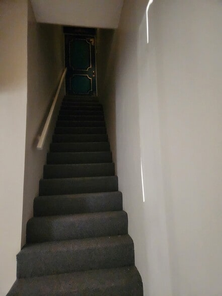 Back staircase to apartment - 111 Verbeke St