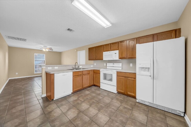 Building Photo - Charming single story 3-bedroom, 2-bath home nestled in a quiet, well-established neighborhood in...