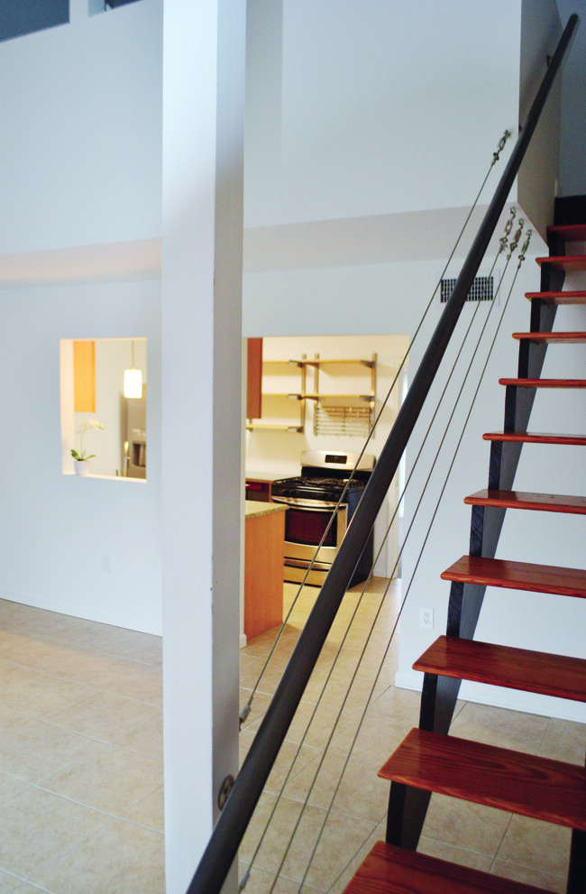 Front living room, stairs to loft. - 452 S Main St