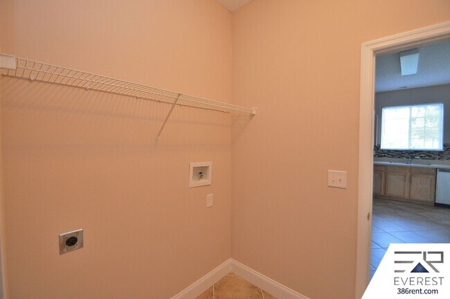 Building Photo - SPACIOUS, FULLY FENCED 4/2.5/2 IN DESIRABLE MATANZAS WOODS