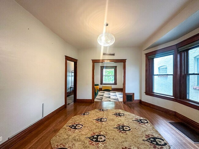 Building Photo - A home where old-world charm meets modern sophistication!