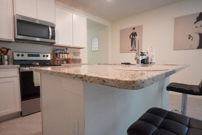 Building Photo - 10770 SW Vasari Way