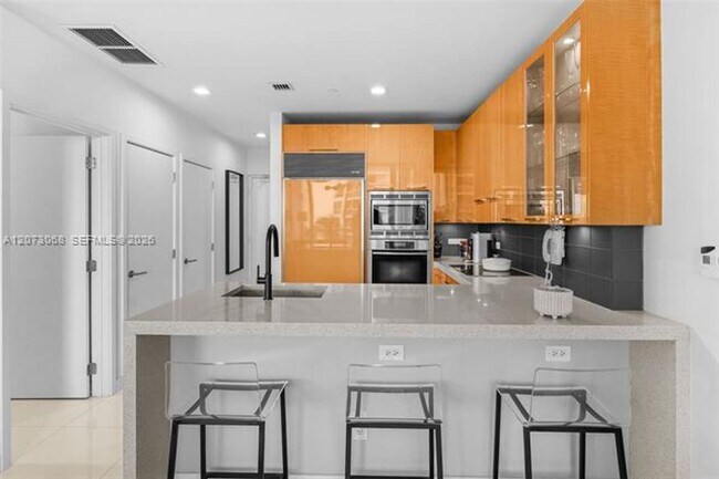 Building Photo - 6799 Collins Ave