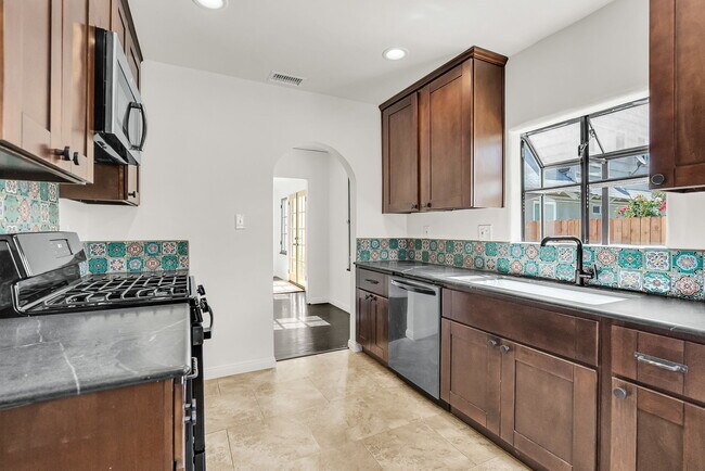 Building Photo - 4654 Merrill Ave