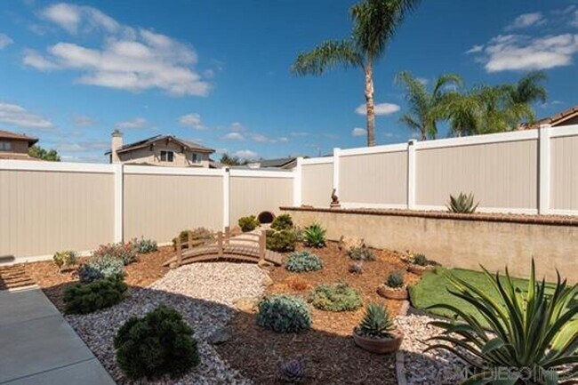 Building Photo - Beautifully Remodeled Home with outdoor Kitchen and Spa!