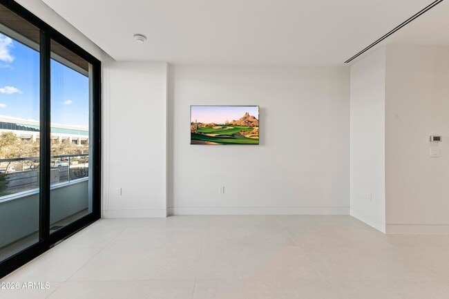 Building Photo - 6587 N Palmeraie Blvd