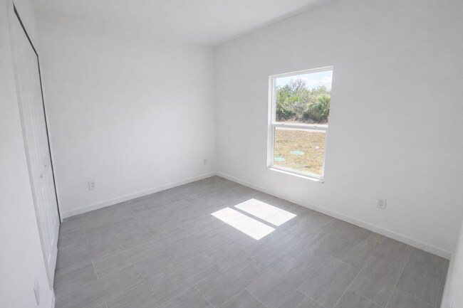 Building Photo - NEW CONSTRUCTION- Modern 3 Bed / 2 Bath Home in E Lehigh Acres