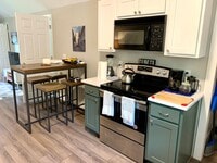 Building Photo - Modern 1 Bedroom Upstairs Apartment in Madison