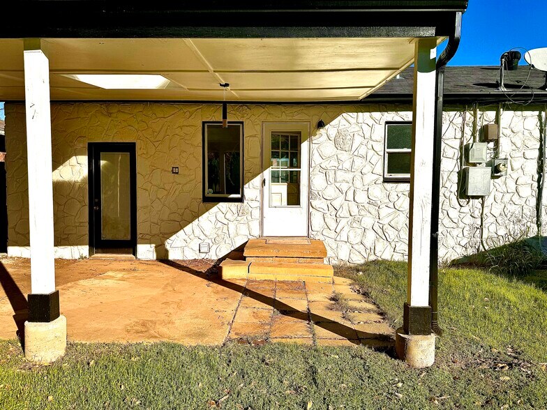 Covered patio with sunroof - 2710 NW 57th St