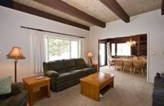 Building Photo - Unique open design,wood beams in all rooms-Very cheery and cozy. Newly remodeled, and newly furni...