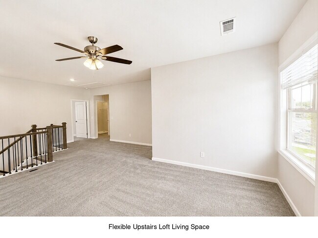 Building Photo - Spacious 4BR/3BA Home with First Floor Suite &  Loft
