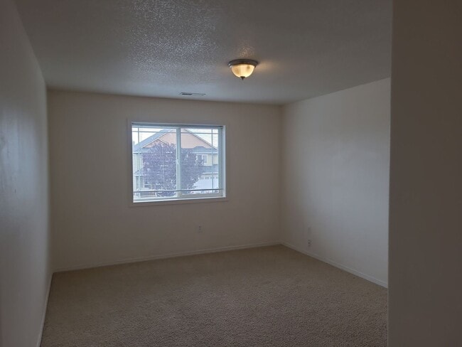 Building Photo - 4 Bedroom with Garage on a Corner Lot